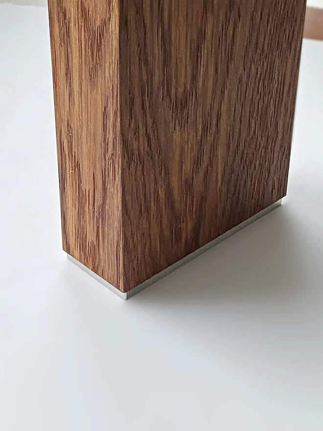 Rimaseinän tilanjakajapalkin kiinnitysosa